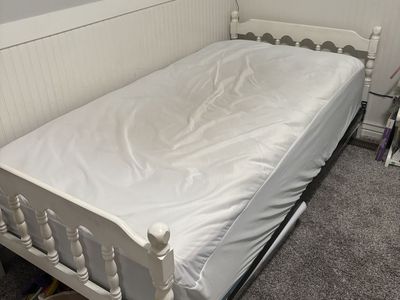 Twin white bed