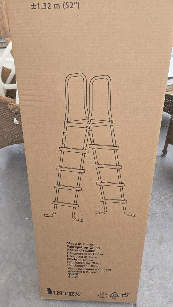 New in the box Intex 52 inch ladder.