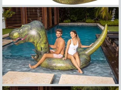 PoolCandy 8.5ft Dinosaur Gigantic Pool Raft - Heavy-Duty PVC Vinyl, 500 lbs capacity