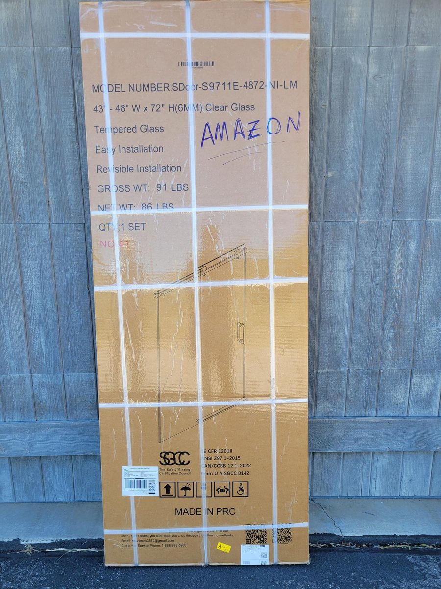 Frameless shower door 43-48" X 72" in brushed nickel