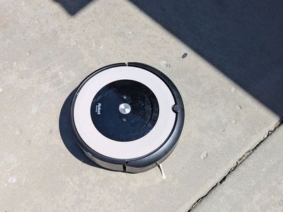 iRobot Roomba E5 with charger and virtual wall accessory