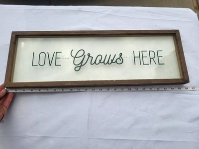 Wooden Framed Wall Sign "LOVE... Grows... HERE" - 25 Inch
