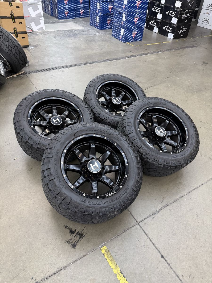 20x10 hostile “rage” wheels/ 295/55/20 Nitto tires 8x6.5
