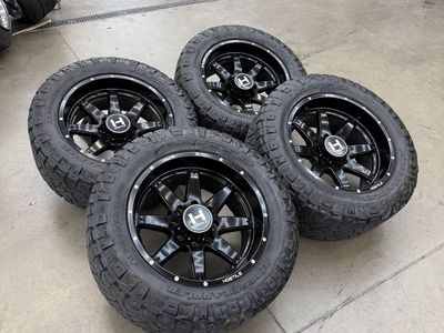 20x10 hostile “rage” wheels/ 295/55/20 Nitto tires 8x6.5