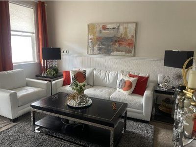 Lexington Upholstery Oliver Sofa, a stylish 3-seat couch and chair
