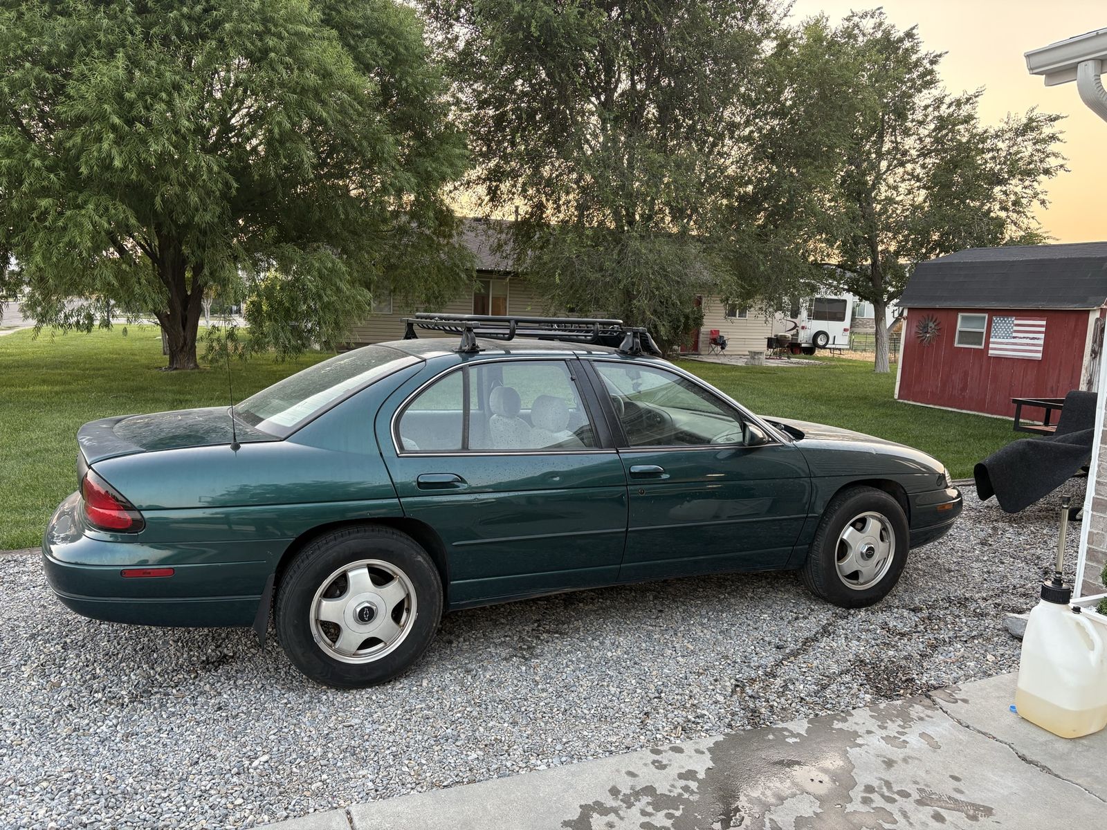 Green Chevrolet Lumina Sedan with Roof Rack