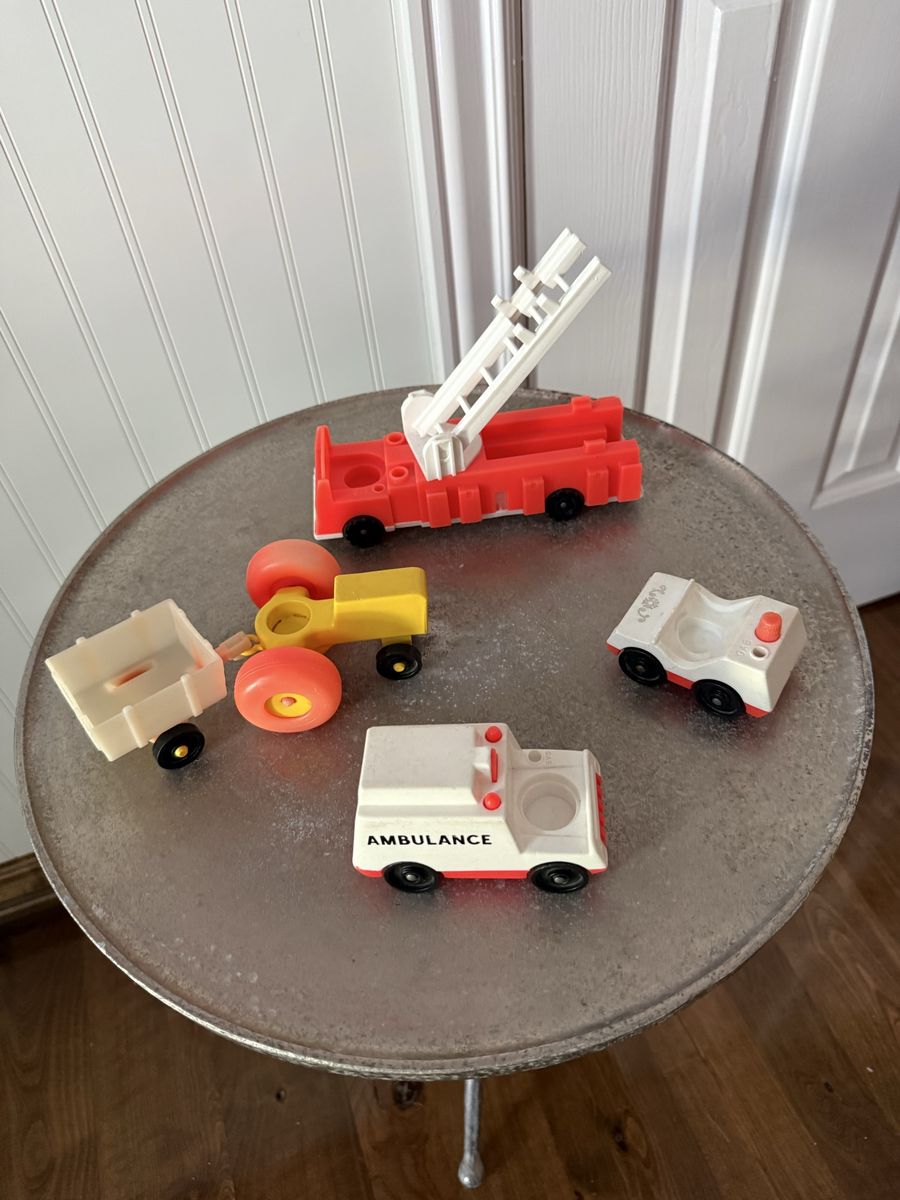 Vintage set of Fisher Price little people vehicles