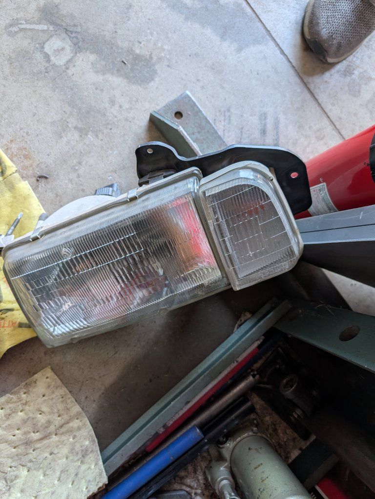 1996 Geo tracker headlight assembly