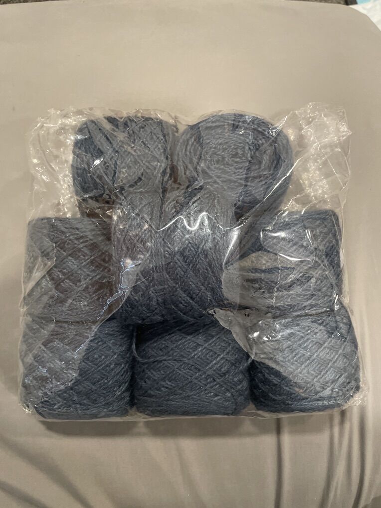 9 Rolls of blue yarn New