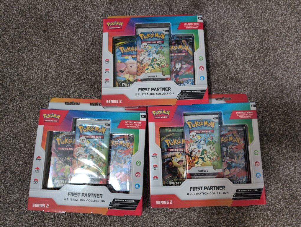 3 Pokemon First Partner Illustration Collection -each including a series 2 Trading Card Game Booster Packs & Sticker