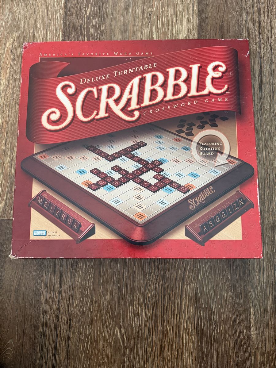 This is a 2001 Parker Brothers Deluxe Turntable Scrabble crossword game board
