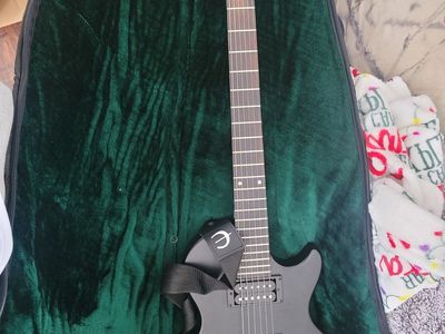 Epiphone special II guitar with carrying bag.