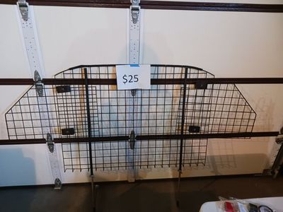 Auto safe pet gate adjustable separator. Keep your hunting dog safe. $25 cash