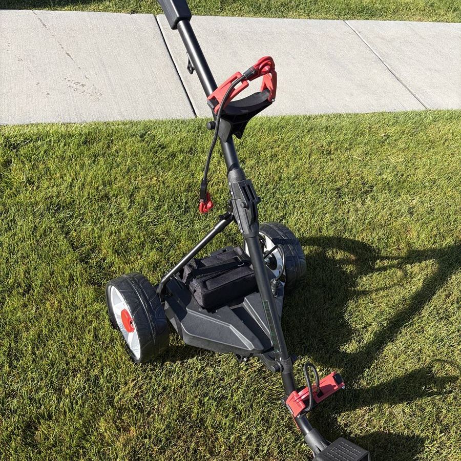 Walk behind electric golf cart