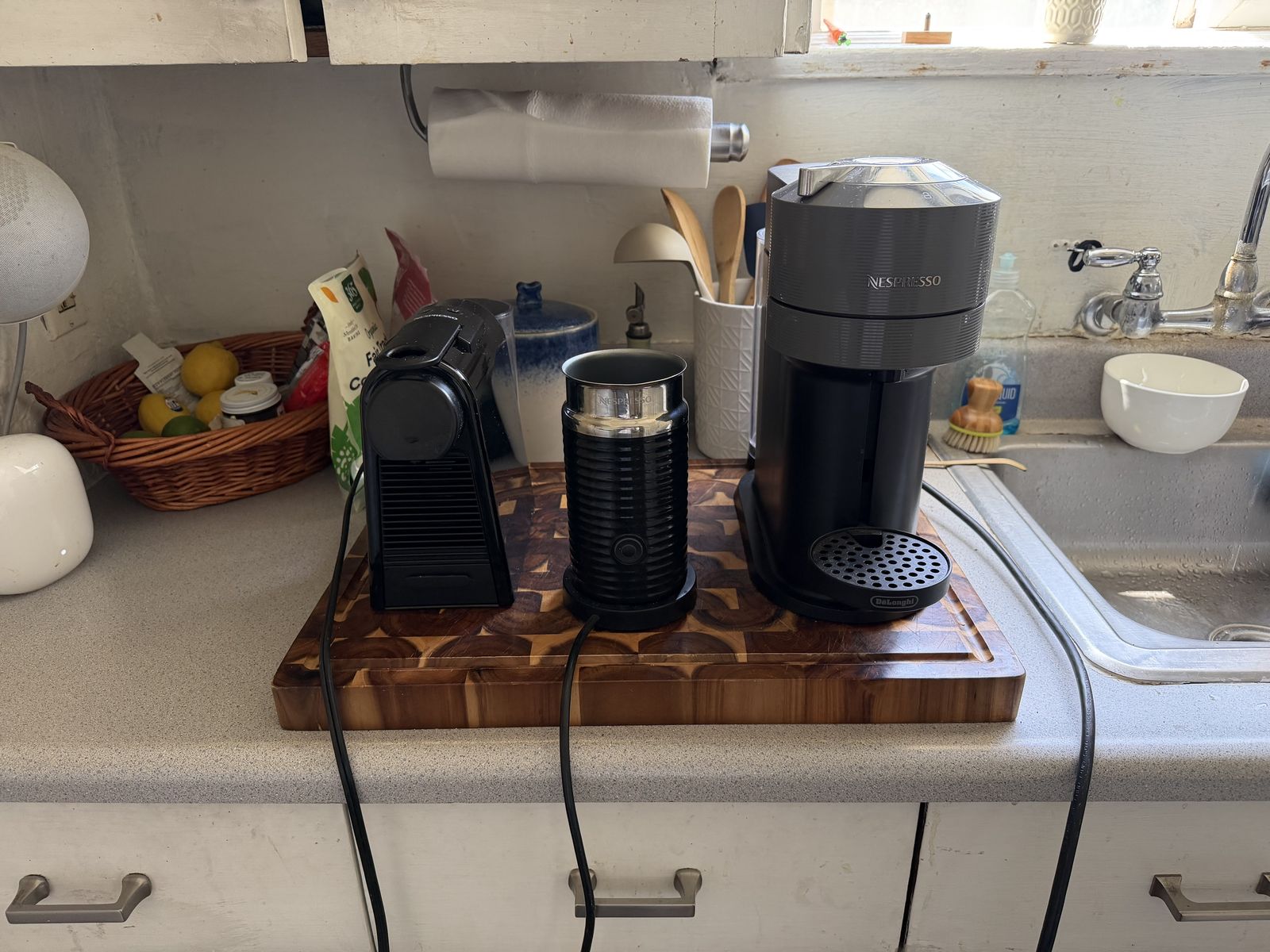 Nespresso Essenza Mini machine, Vertuo Next machine, and Aeroccino frother