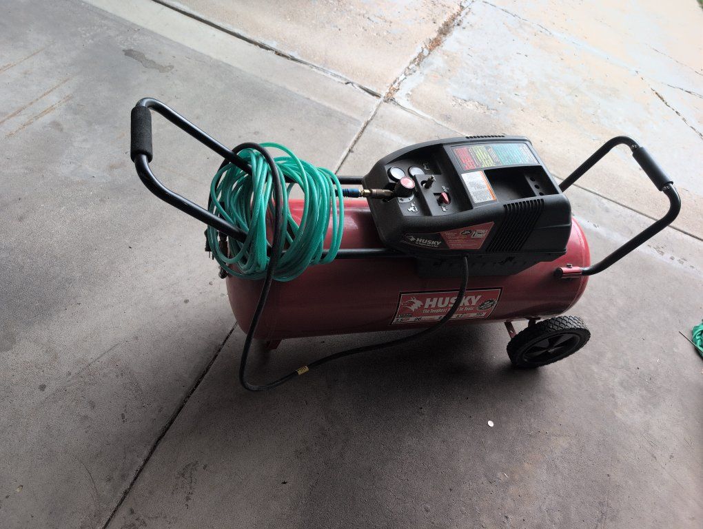 Husky 26 Gal. 150 Max PSI Portable Electric Air Compressor with Hose and Wheels - Used