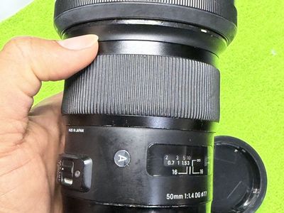 Sigma 50mm 1:1.4 DG DN Art Lens for Sony E-mount (FE) with Lens Hood (filter ring was gone)