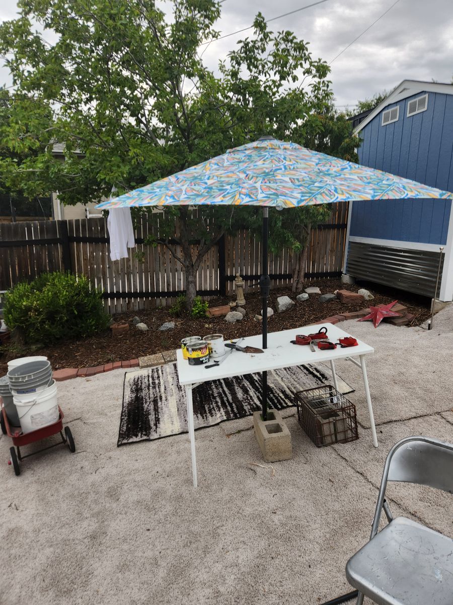 8 foot patio umbrella.  Almost brand new.  Perfect condition.  Crank and tilt work perfect.  Also has a the cover bag.