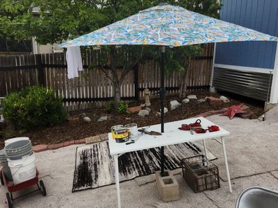 8 foot patio umbrella. Almost brand new. Perfect condition. Crank and tilt work perfect. Also has a the cover bag.