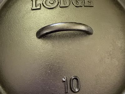 Lodge 10 Cast Iron Dutch Oven - Pre-Seasoned with Lid and Wire Handle