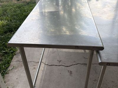 Stainless steel commercial work table