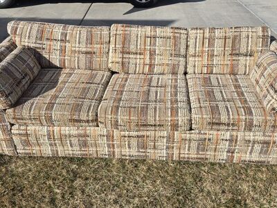 vintage 1970s tweed upholstered sofa.