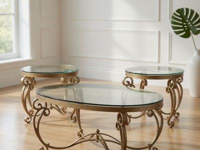 4 piece high-end gold and glass top table set.