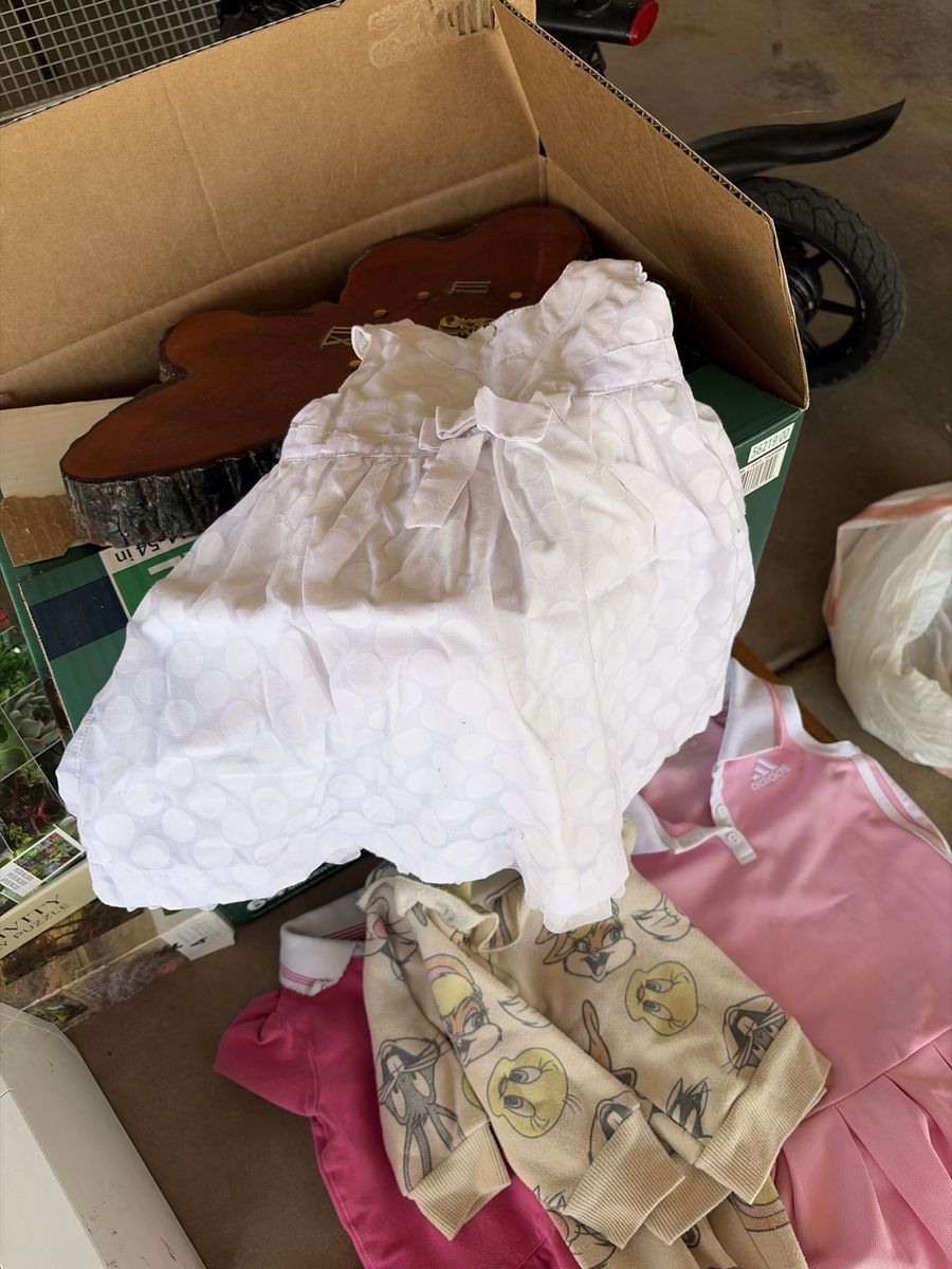 Sleeveless White Polka Dot Baby Dress with Front Bow Accent