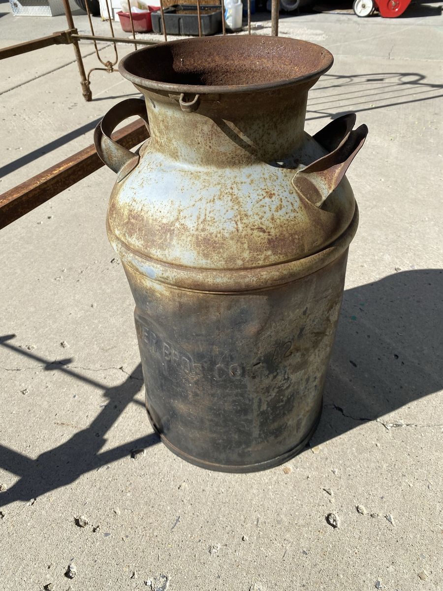 Antique milk can