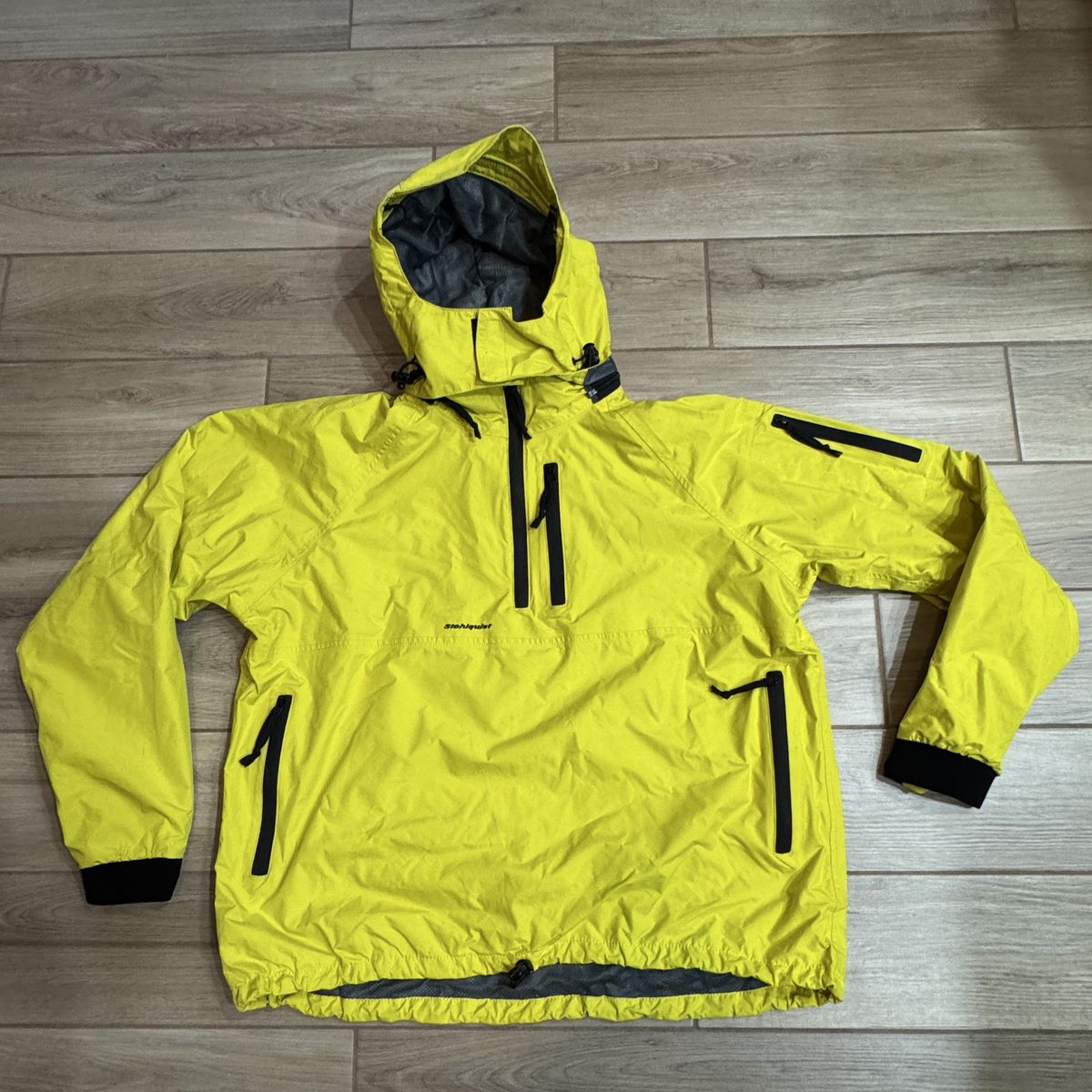 Stohlquist Torrent ST Yellow Waterproof Hooded Paddling Jacket Size XL. Features a removable hood with zipper attachment. 