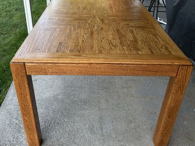 Solid Oak Dining Table – Sturdy, Good Condition – 59” x 41”