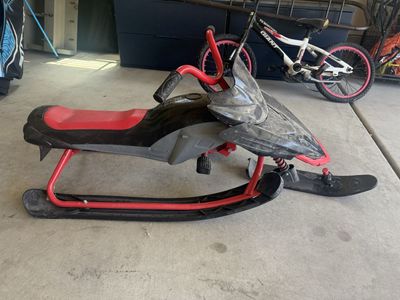 Driving snow sled