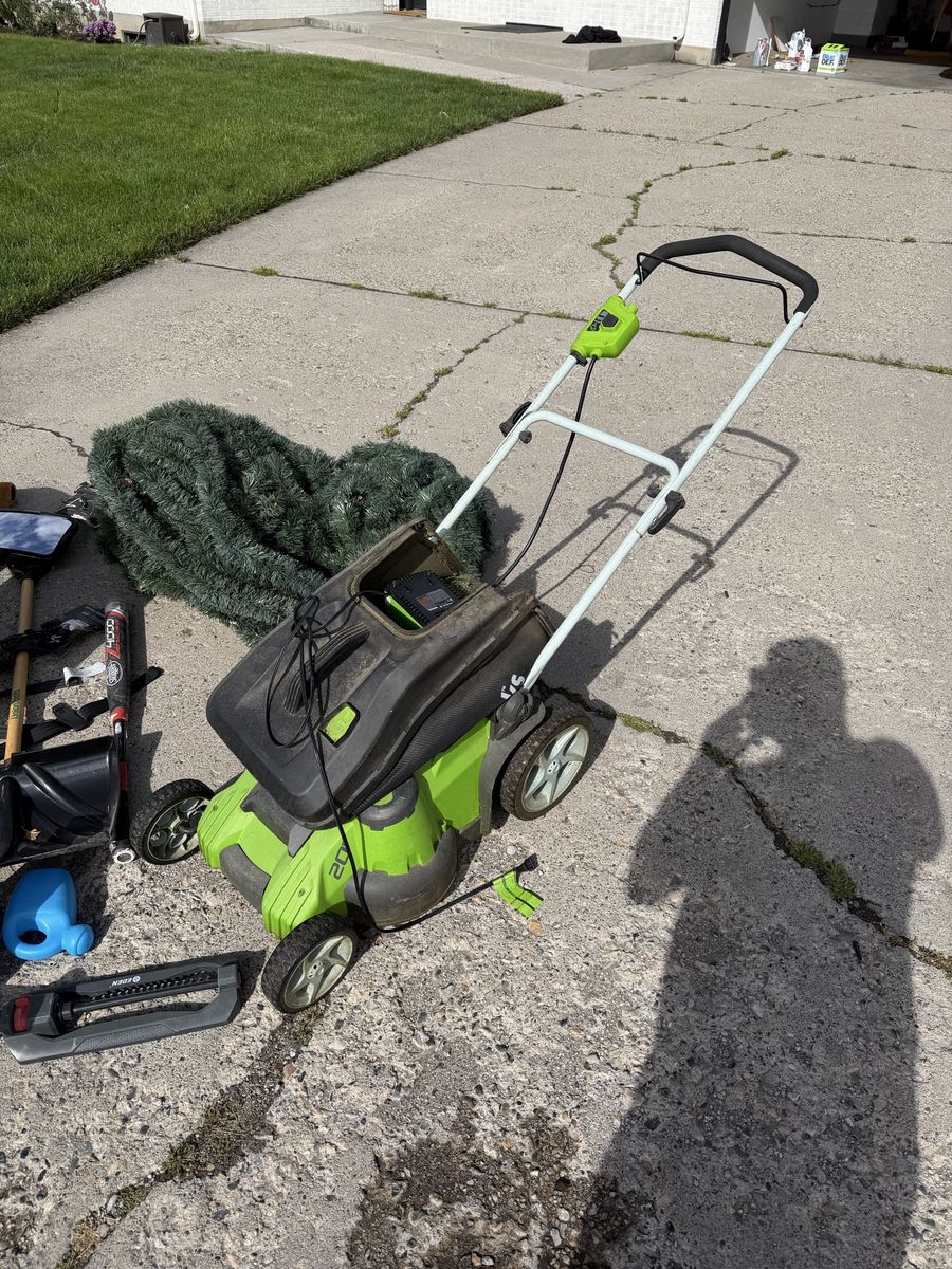 Free electric lawn mower with batteries