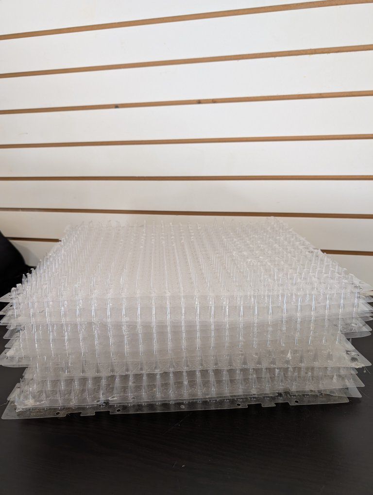 Clear Plastic Anti-Bird & Animal Deterrent Spike Mats Stack