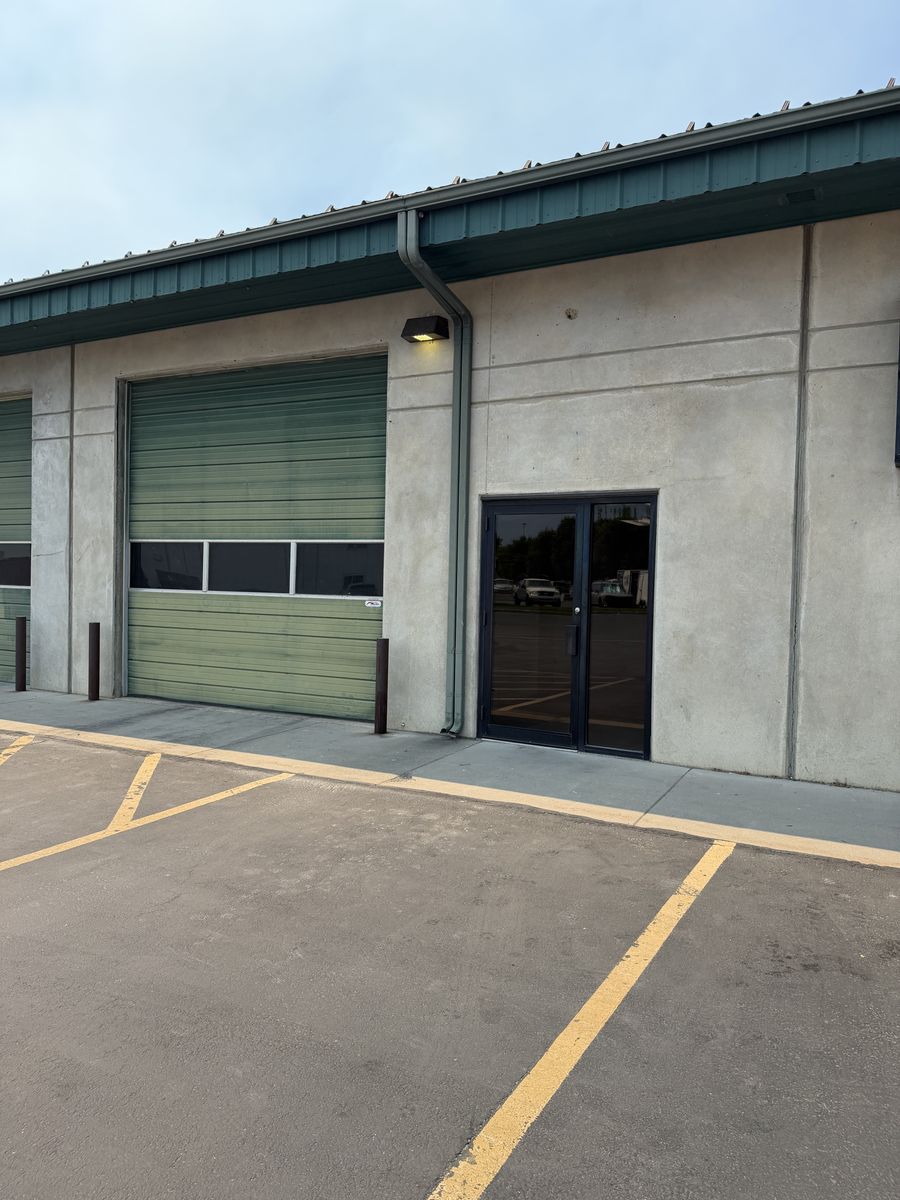 GREAT VALUE!  MAIN STREET WAREHOUSE, OFFICE, RESTROOM, SHOP SINK, STAIRS TO MEZZANINE LEVEL.