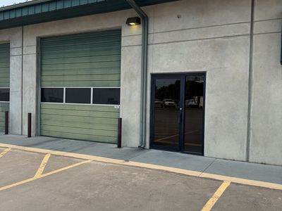 GREAT VALUE! MAIN STREET WAREHOUSE, OFFICE, RESTROOM, SHOP SINK, STAIRS TO MEZZANINE LEVEL.