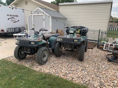 Pair of Polaris Sportsman 4x4 ATVs - Used, Green