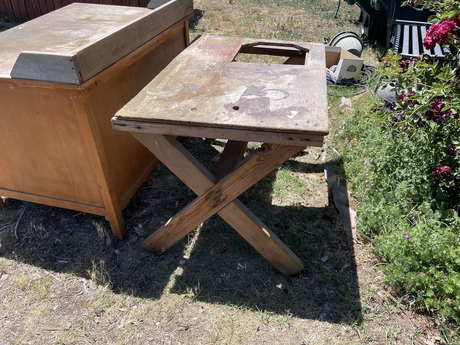 Old table used to hold a table saw, could be used to make a picnic table