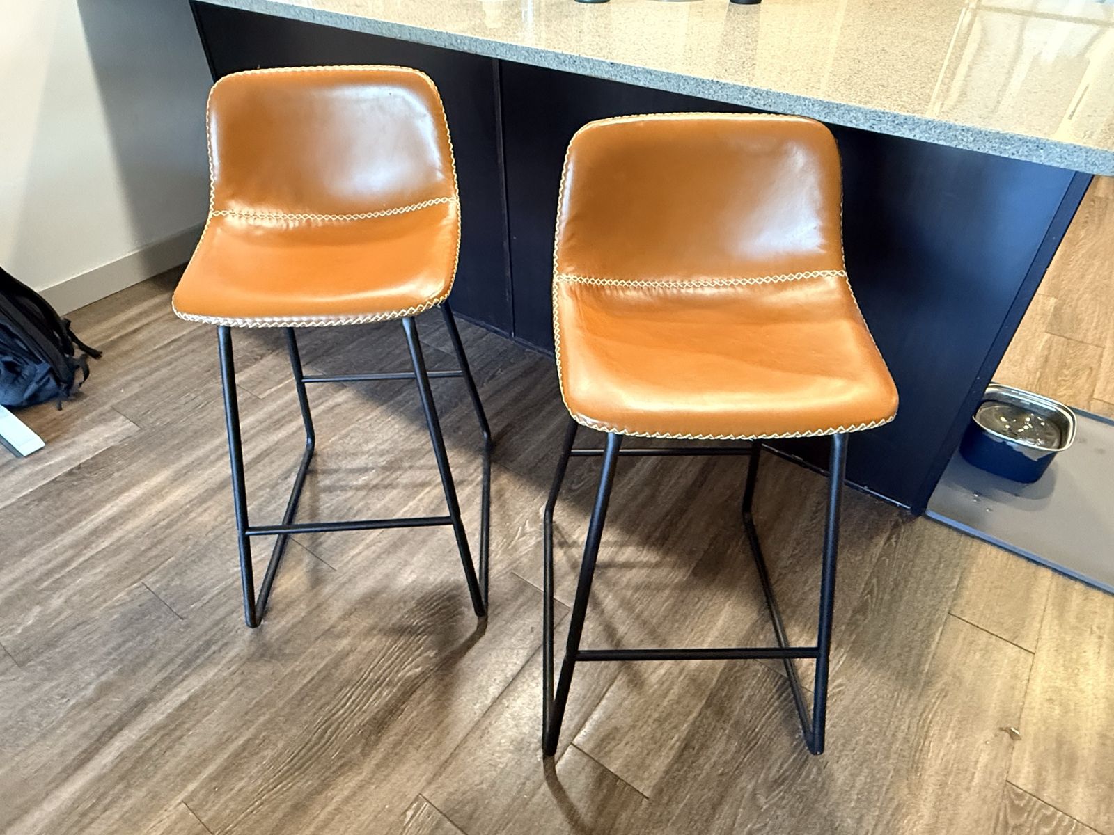 Pair of Mid-Century Modern Counter Stools - Tan Faux Leather with Black Metal Legs