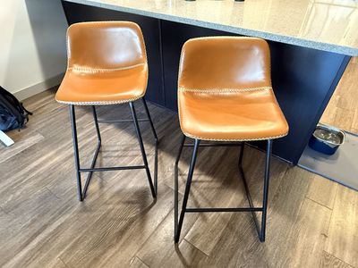 Pair of Mid-Century Modern Counter Stools - Tan Faux Leather with Black Metal Legs