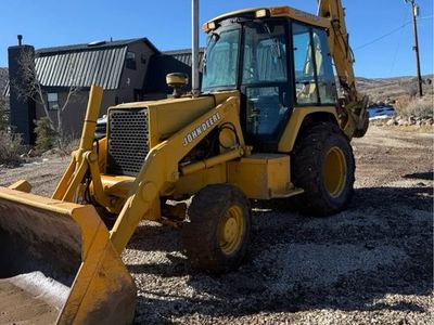 1997 John Deere Backhoe 310D