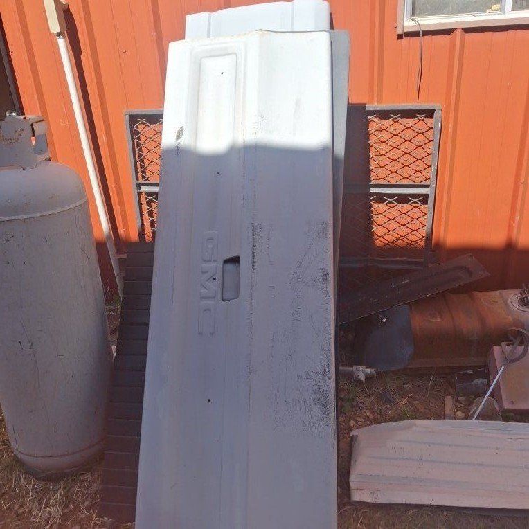 1986 gmc tailgate oe  linex inside ready for paint
