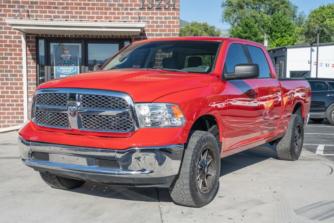 2019 RAM 1500 SLT — rebuilt & branded title, 18% below market