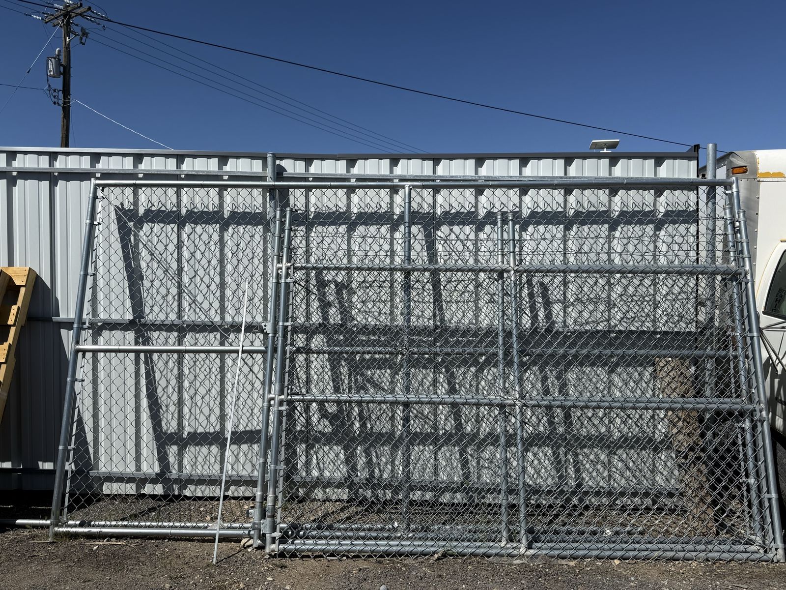 Used commercial chain link swing gate  6" X 14'