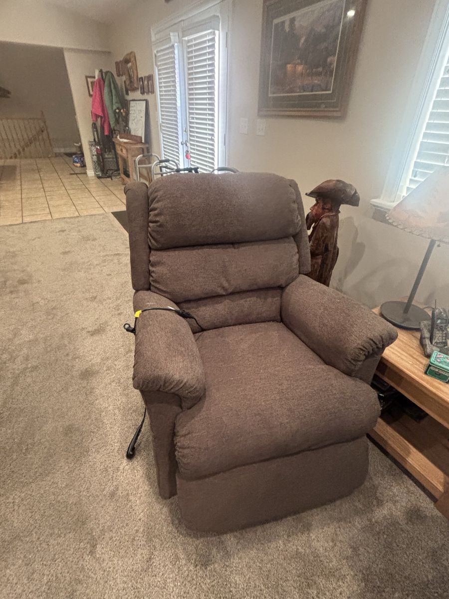 Comfortable Brown Power Recliner lift chair.