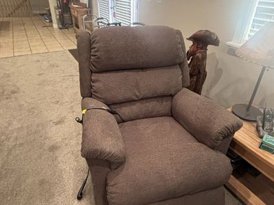 Comfortable Brown Power Recliner lift chair.
