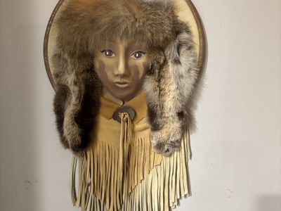 “Little Hand” leather and fur wall hanging