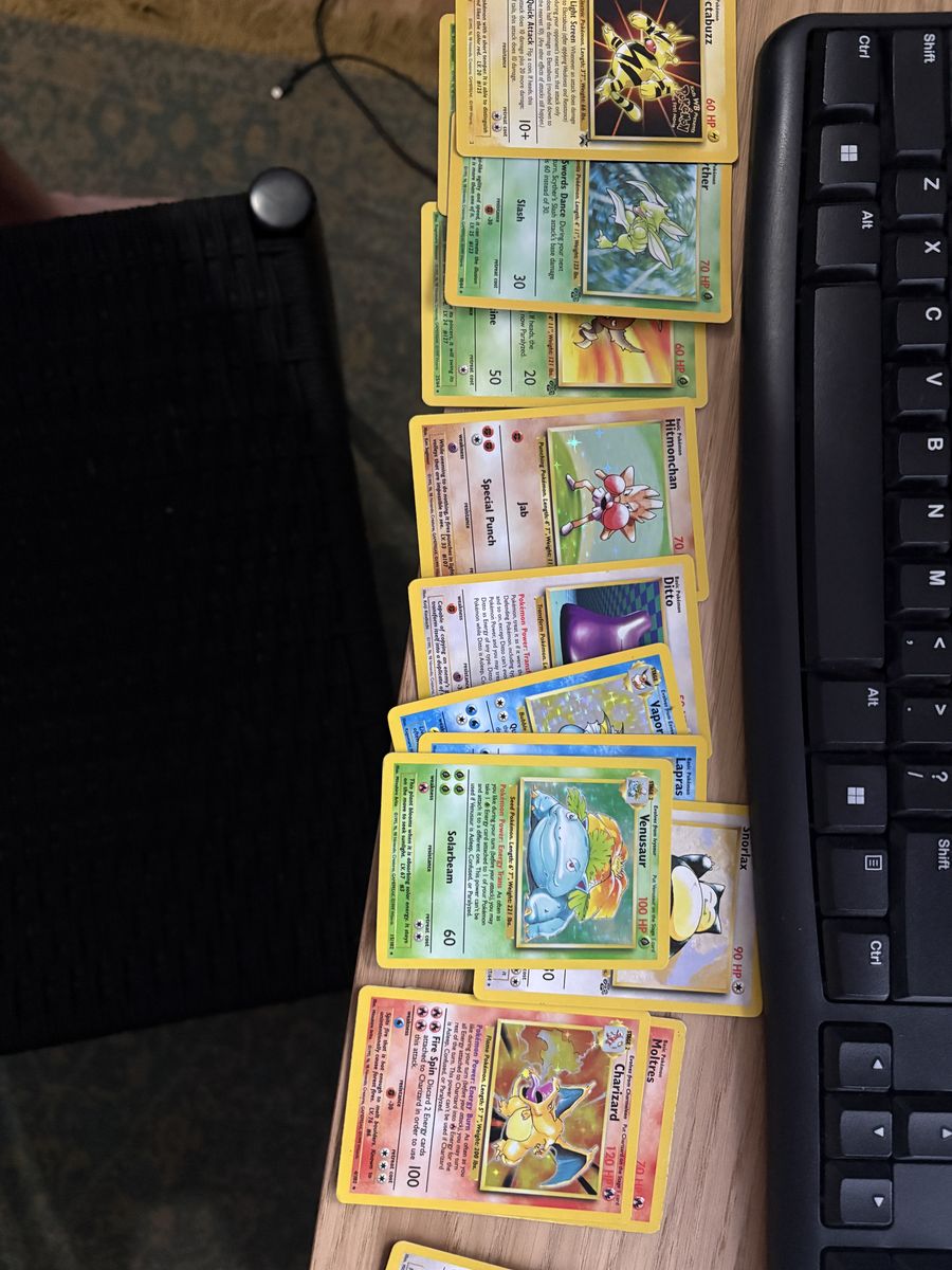 Pokémon cards various holograms and Charizard 