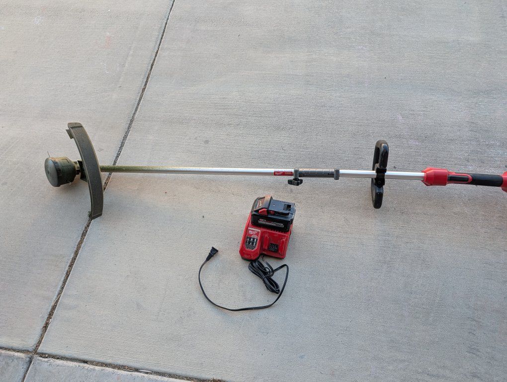 Milwaukee M18 String Trimmer with 8AH battery.