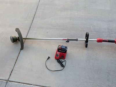 Milwaukee M18 String Trimmer with 8AH battery.